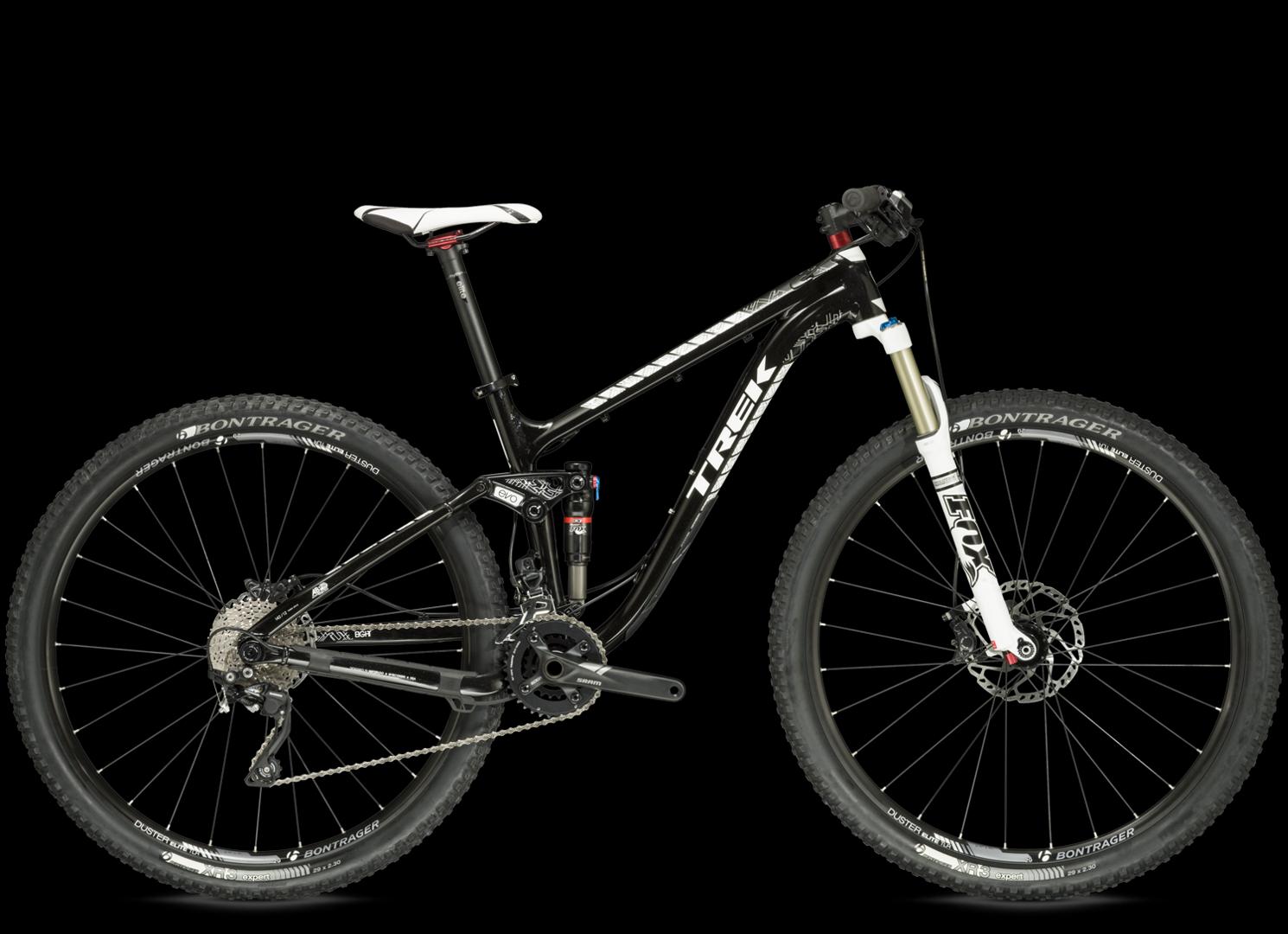 Trek 2014 trek fuel ex 8 27.5: A black mountain bike with a sleek design featuring a white fork and saddle. The bike is equipped with Bontrager tires and Shimano components, showcasing a high-performance gear setup suitable for off-road cycling. The background is black to emphasize the bike's standout features.