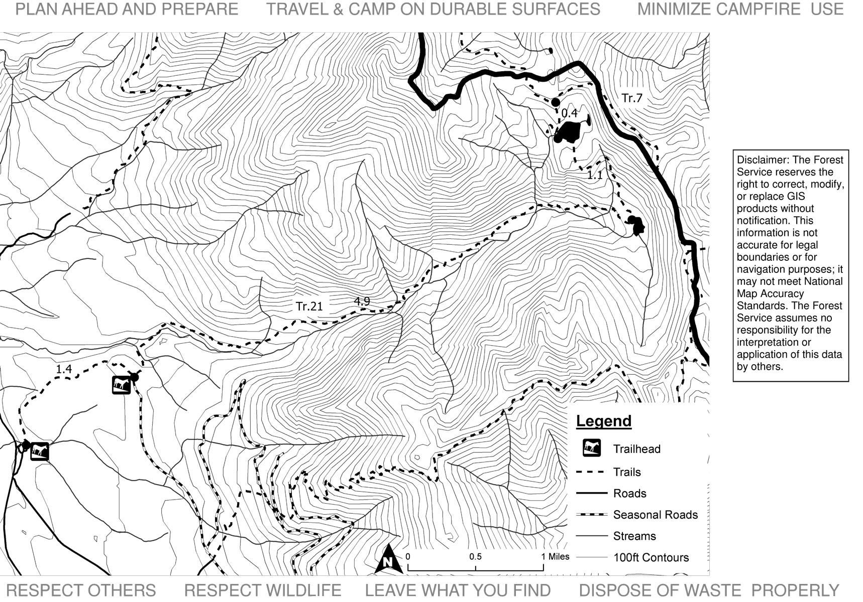 Alt text: A black and white topographic map displaying trails, roads, and contour lines. The map includes a legend indicating trailheads, trails, roads, seasonal roads, and streams. Additional text warns about data accuracy and outlines guidelines for outdoor activities, such as minimizing campfire use and respecting wildlife. Bond Creek Trail #21 mountain bike trail.