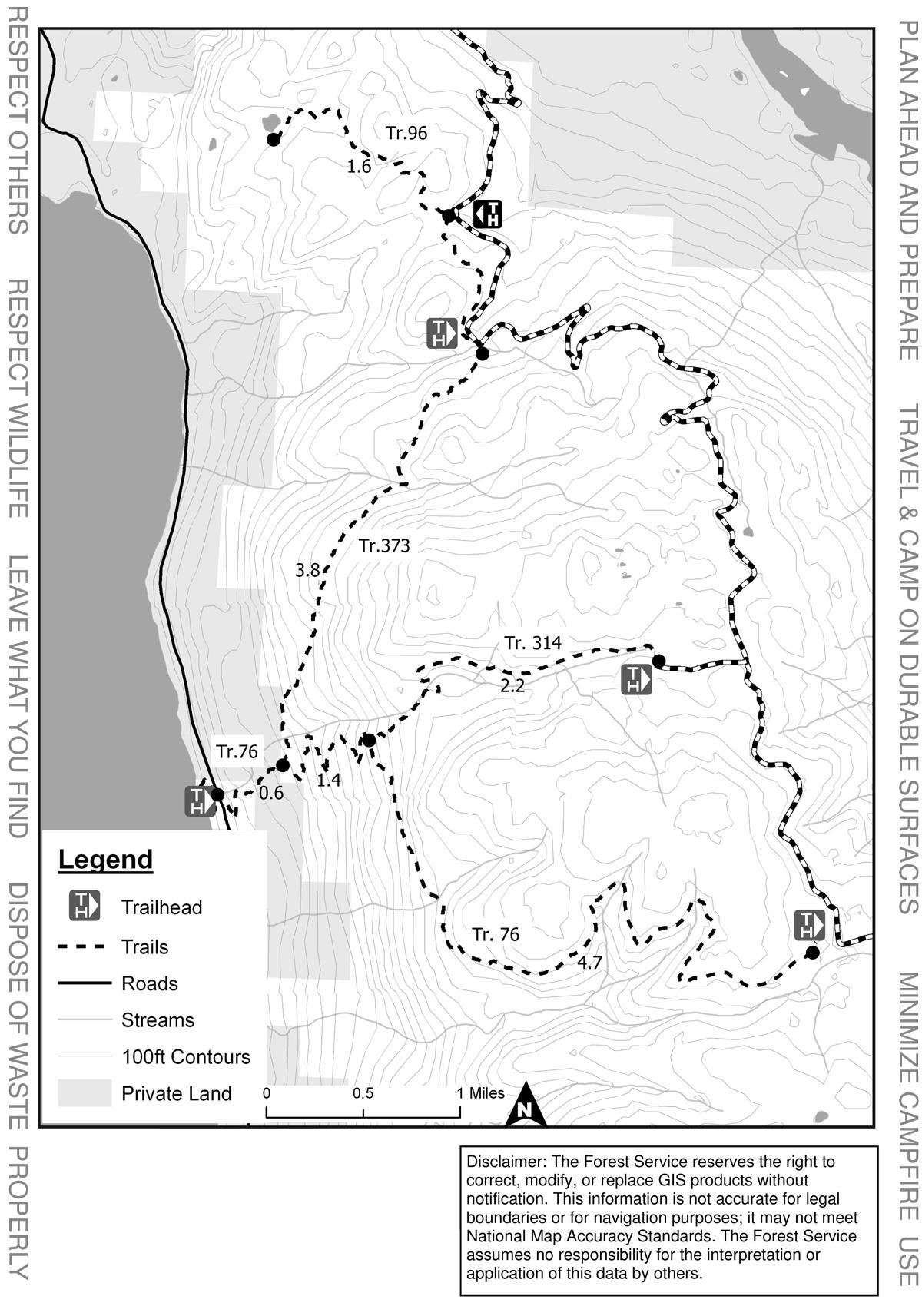 Map showing trails, trailheads, roads, streams, and contour lines in a forested area. The legend details symbols for trailheads, trails, roads, streams, and private land, with distance markers and disclaimers about map accuracy. Crane Creek Trail #314 mountain bike trail.
