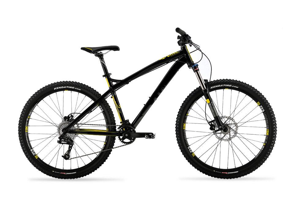 Diamondback Line: A black mountain bike with yellow accents, featuring a sturdy frame, knobby tires, and front suspension. The bike is positioned against a white background.