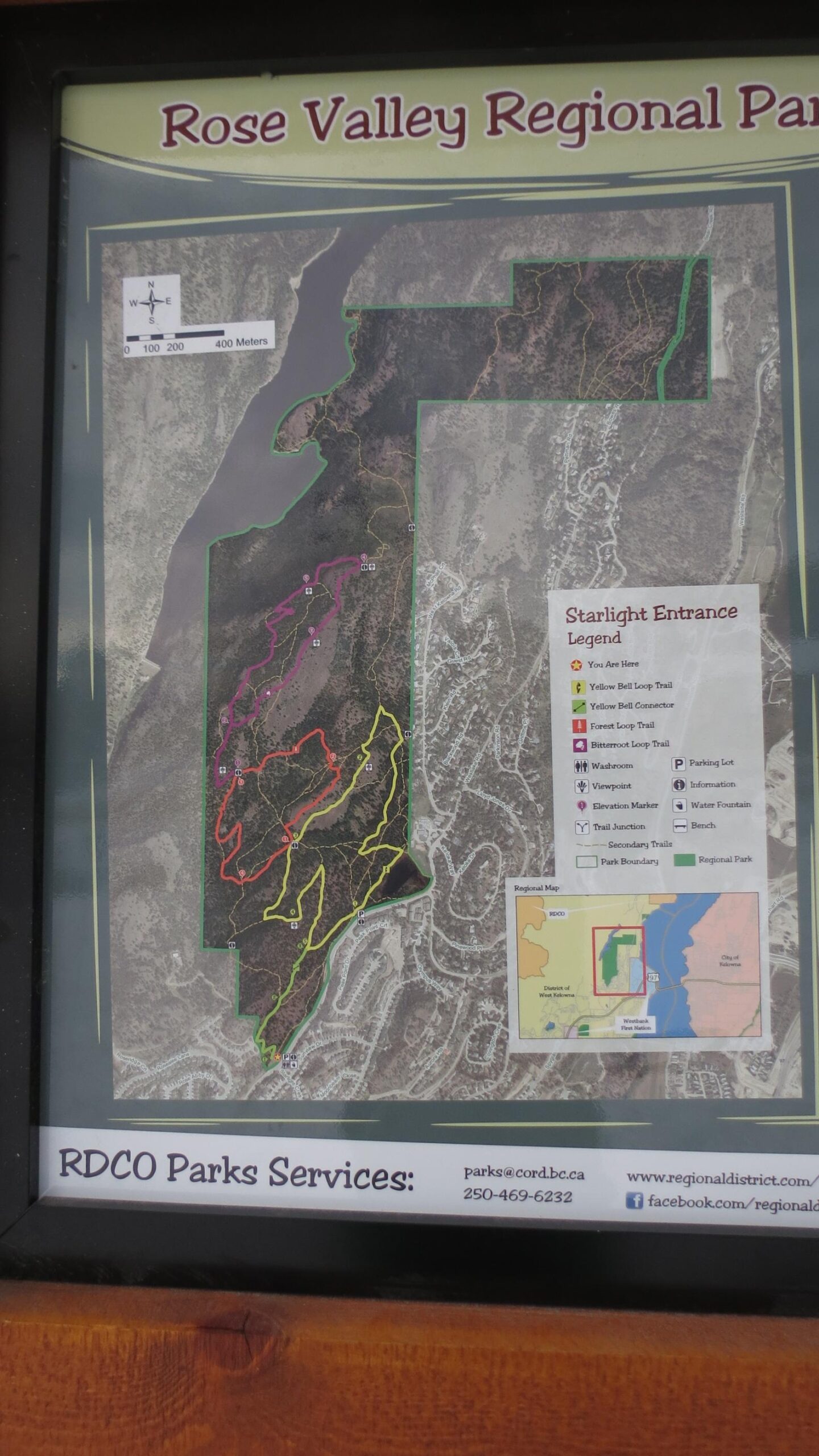 Map of Rose Valley Regional Park showing trails and landmarks, including trail entrances, parking lot, and restroom locations, with color-coded paths and an inset map for orientation. Rose Valley Resevoir mountain bike trail.