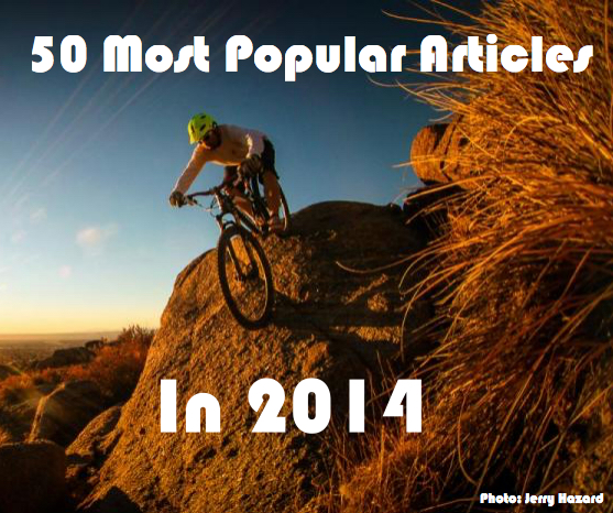 A mountain biker navigating a rocky terrain during sunset, with the text overlay reading "50 Most Popular Articles In 2014." The image features colorful lighting and emphasizes the adventurous spirit of cycling. The photo is credited to Jerry Hazard.