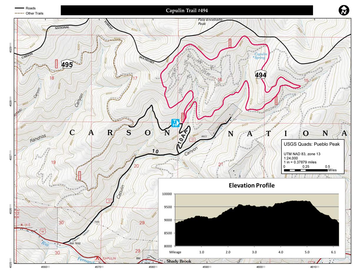 Map of Capulin Trail #494 in Carson National Forest, featuring marked trails, elevation contours, and an inset showing the elevation profile for the trail. The map highlights key points of interest, roads, and other trails, with a scale indicating distance. Capulin Trail #494 mountain bike trail.