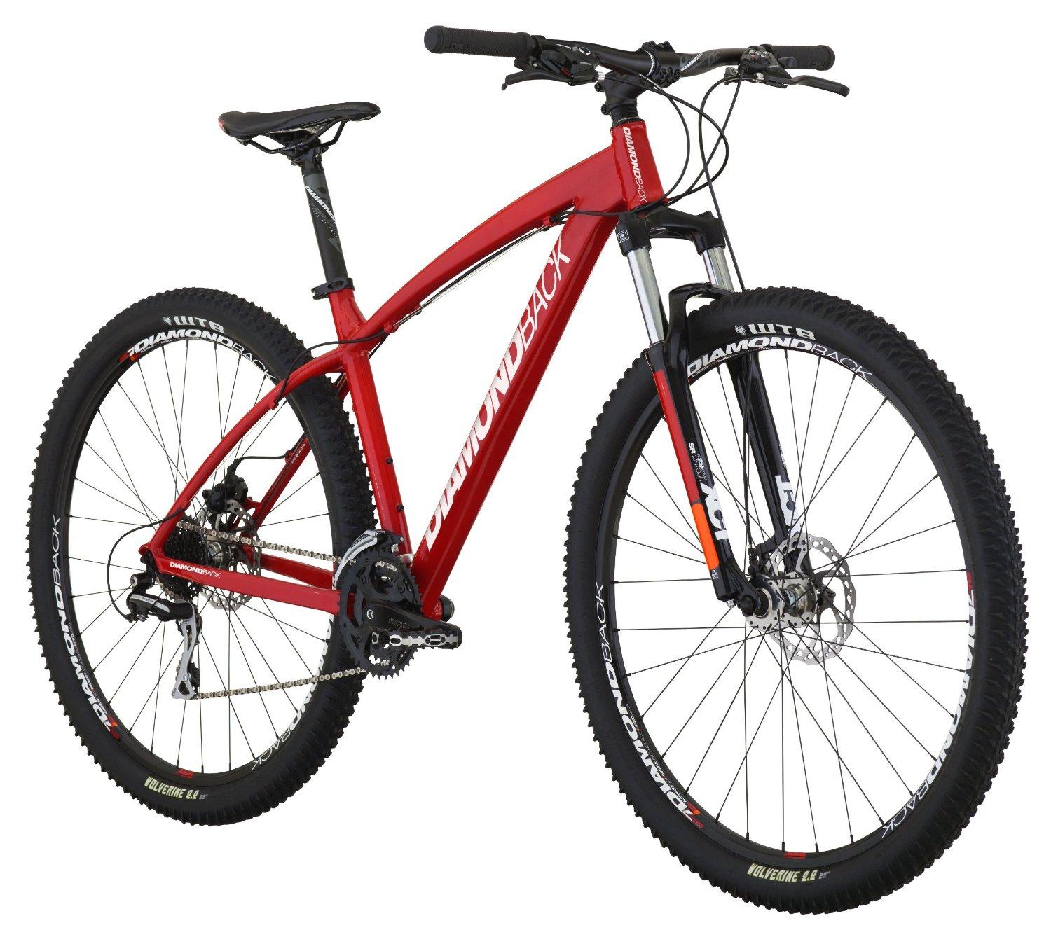 Diamondback Overdrive: Mountain bike with a sleek red frame, featuring a Diamondback logo, front suspension fork, disc brakes, and rugged tires designed for off-road terrain.