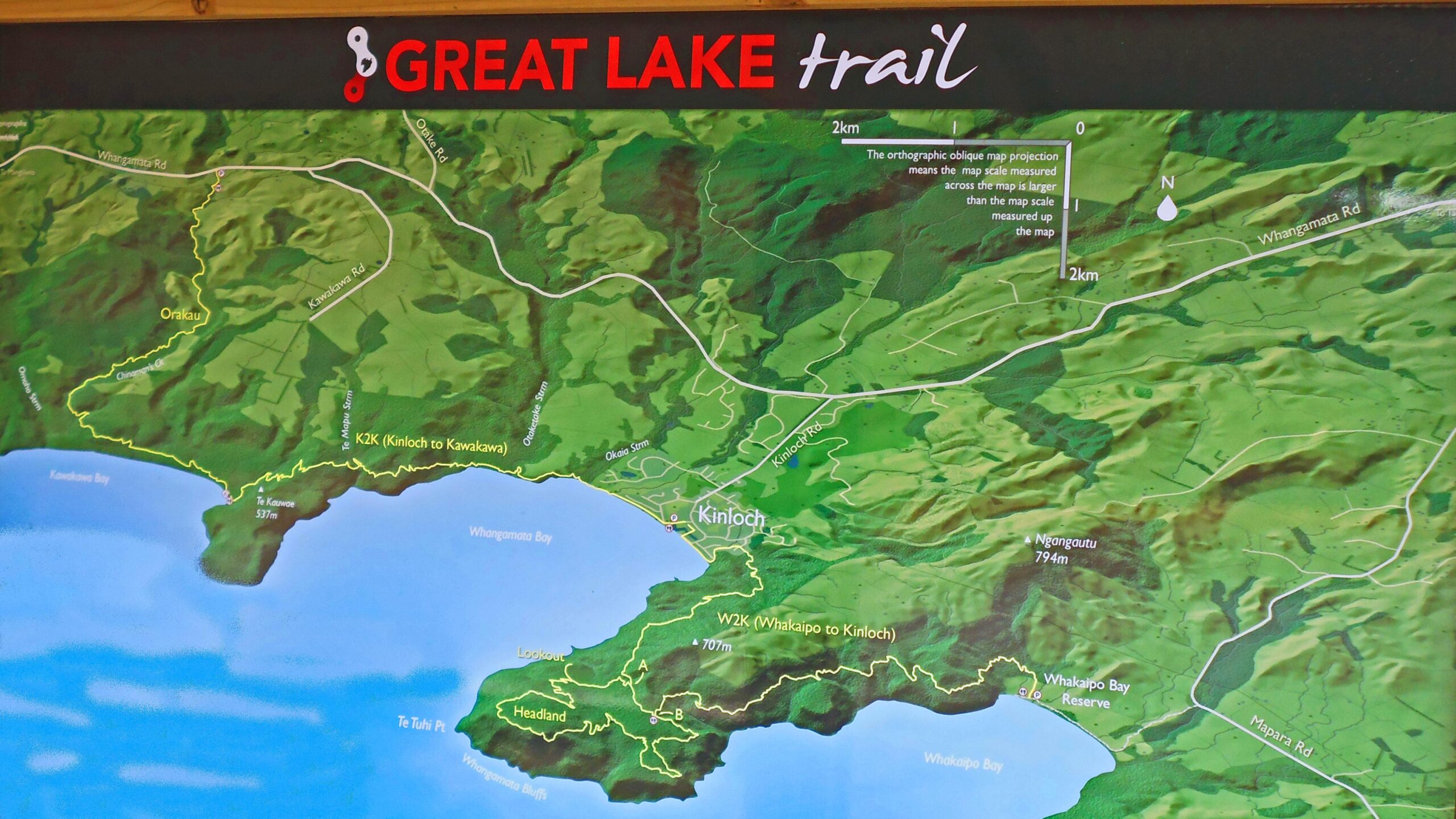 Map of the Great Lake Trail, featuring the surrounding areas of Kinloch, Orakau, and Whangamata Bay. The map highlights walking and biking routes, elevation points, and nearby roads, with a legend indicating distances and scale. Great Lake Trails mountain bike trail.