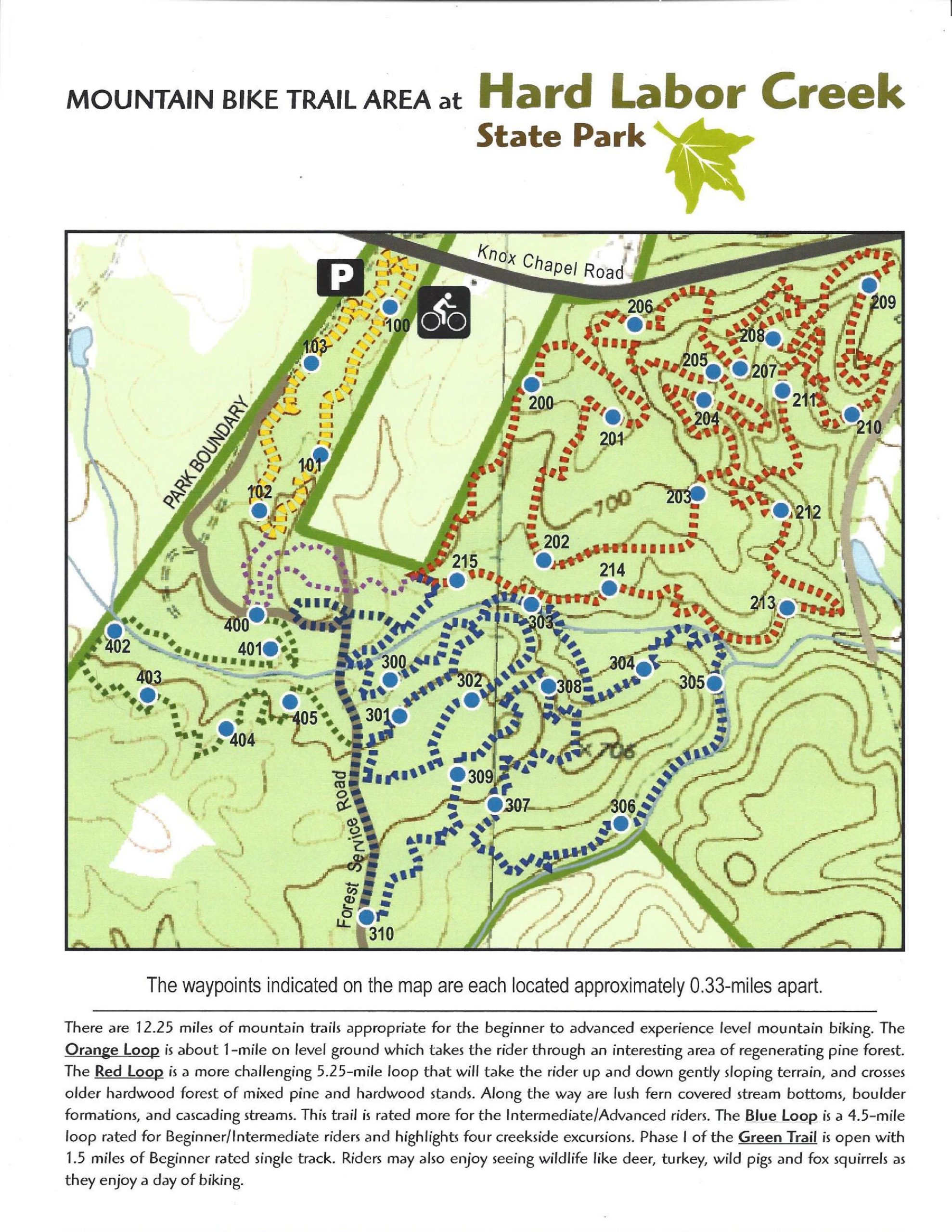 Map of the mountain bike trail area at Hard Labor Creek State Park, featuring various trails suitable for different skill levels. The map highlights the Orange Loop, Red Loop, Blue Loop, and Green Trail, indicating distances, waypoints, and terrain descriptions. Hard Labor Creek State Park mountain bike trail.