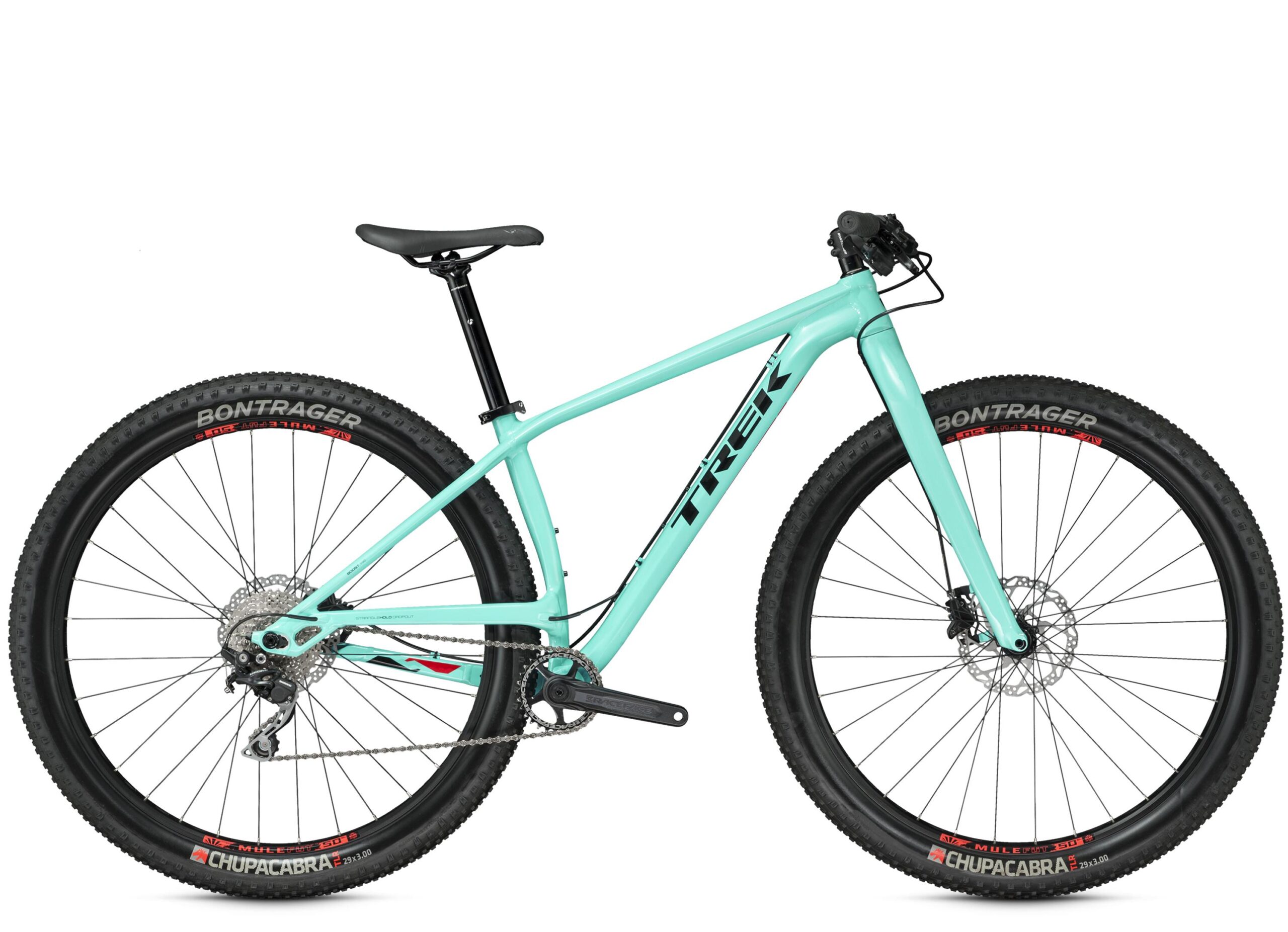 Trek Stache 9: A teal Trek mountain bike with a sleek design, featuring wide tires and disc brakes, positioned against a white background. The bike has a black seat post and handlebars, with Bontrager and Chupacabra branding on the tires.