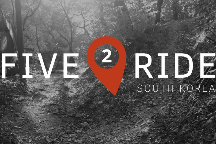 A scenic forest trail in South Korea, depicted in black and white, with the text "FIVE 2 RIDE" and a location pin graphic overlaid in red, reading "SOUTH KOREA."