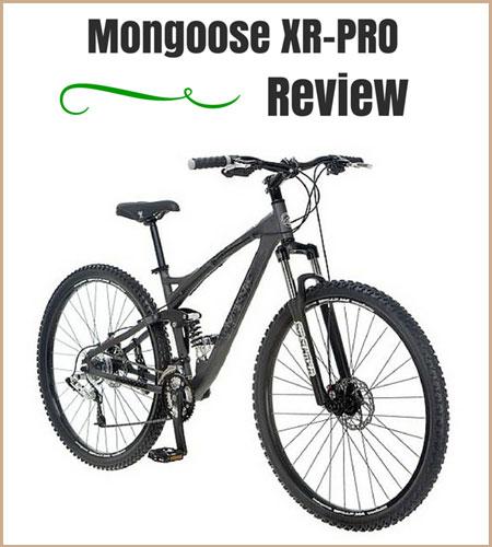 Mongoose MONGOOSE XR-PRO: Image of a Mongoose XR-PRO mountain bike in a review format, showcasing the bike's frame, wheels, and handlebars against a white background with the text "Mongoose XR-PRO Review" prominently displayed.