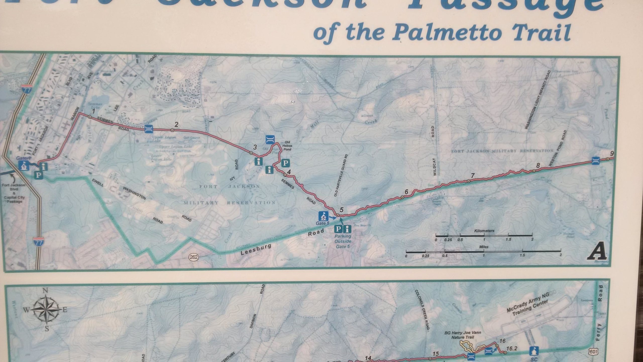 Map of the Fort Jackson Passage of the Palmetto Trail, showing the trail route, parking areas, and nearby landmarks. The map includes elevation contours and a compass rose, with labeled points of interest along the trail. Palmetto Trail (Gate 5) mountain bike trail.