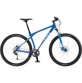 GT Ricochet: A blue mountain bike with a lightweight frame, front suspension, and wide tires, designed for off-road riding. The bike features disc brakes and a prominent brand logo.