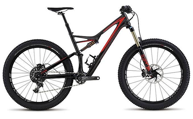 Specialized Stumpjumper FSR 6Fattie: A modern mountain bike with a sleek black and red design. It features a full suspension frame, wide tires for better traction, and front suspension forks. The bike is positioned at an angle to showcase its components and details, including the disc brakes and gear system.