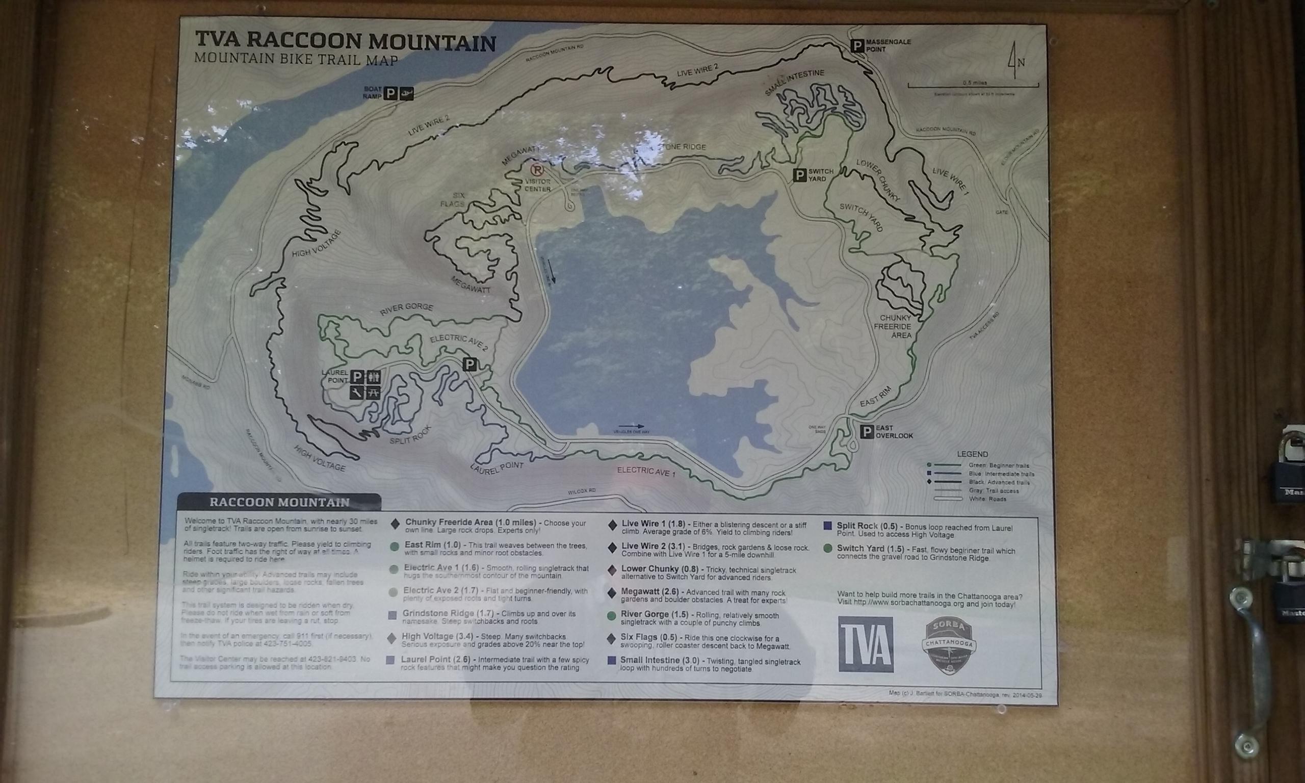 Map of the TVA Raccoon Mountain Mountain Bike Trails, displaying various routes and trail names, along with a legend indicating difficulty levels. The map includes parking locations and details about specific trail features, suitable for planning a biking trip in the area. Raccoon Mountain Trail Network mountain bike trail.