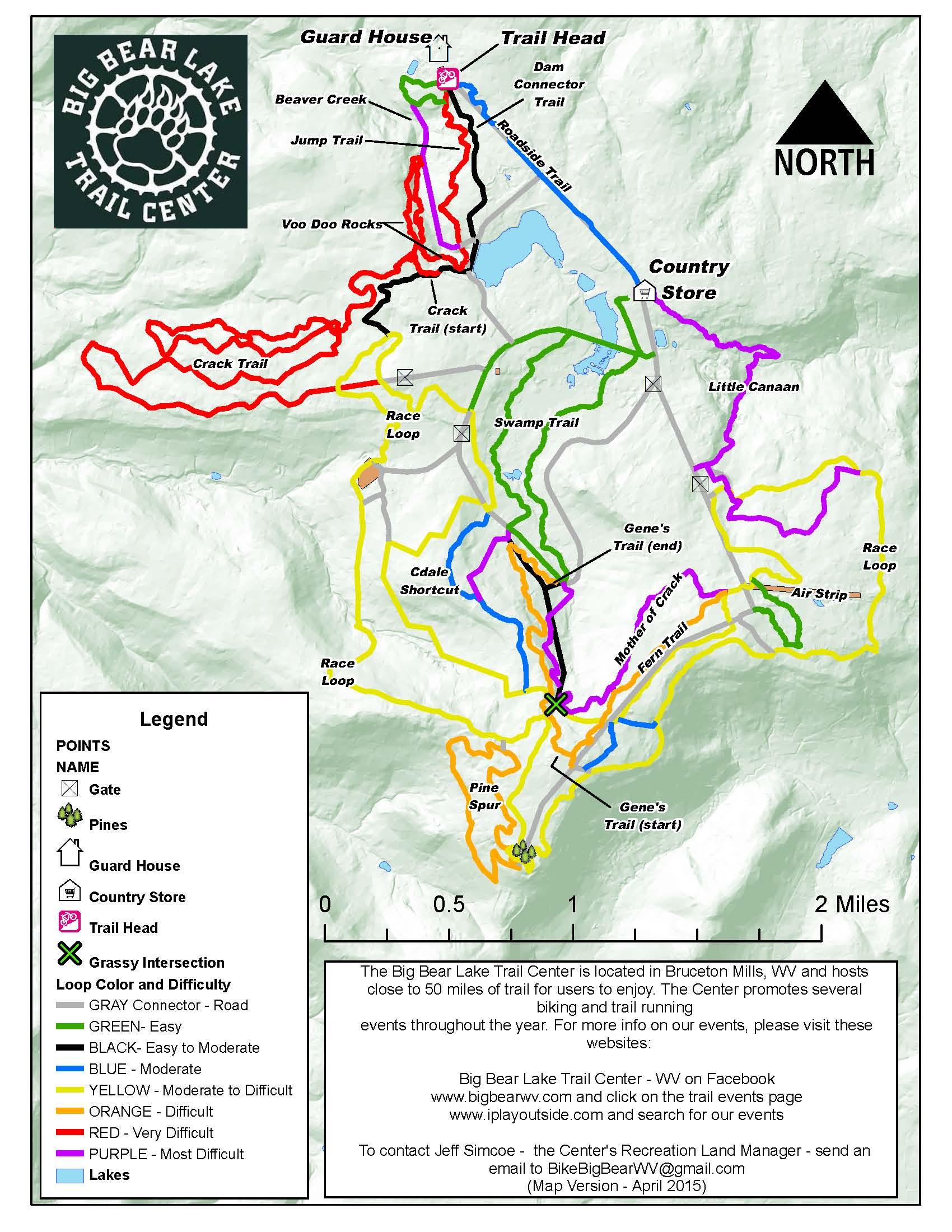 Map of Big Bear Lake Trail Center in Bruceton Mills, WV, showing various trails, difficulty levels, and points of interest such as the Guard House, Trail Head, and Country Store. The map includes a legend for trail colors indicating difficulty, and highlights key features like lakes and grassy intersections. Big Bear Lake Trail Center mountain bike trail.
