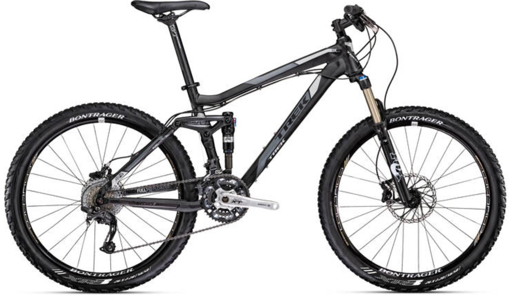 Trek Fuel EX 8: Alt text: A black and gray mountain bike with full suspension, featuring Bontrager tires, Shimano XT drivetrain, and a modern design. The bike is positioned on a white background.
