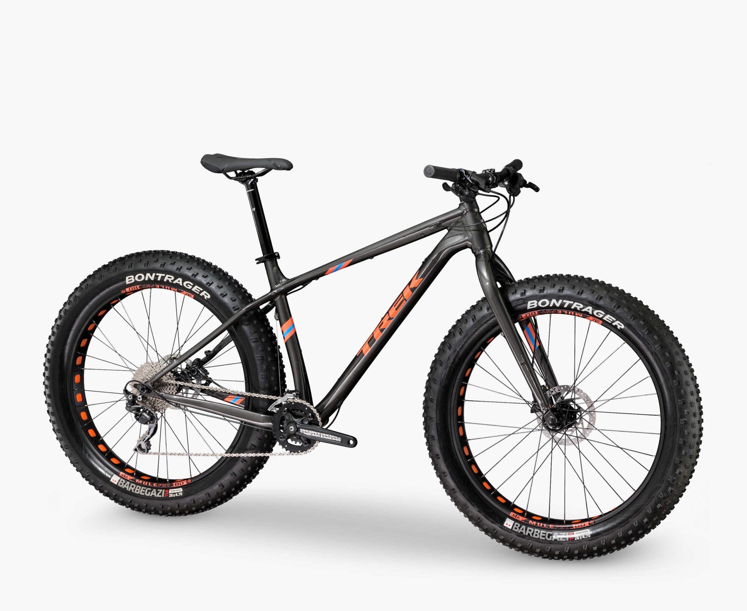 Trek farley 5: A black fat tire mountain bike with a sleek frame, featuring Bontrager wheels and a geometric design. The bike is equipped with a single front chainring and is designed for rugged terrain, showcasing its wide tires and sturdy construction.