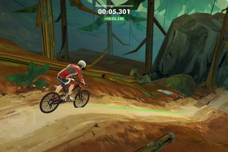 A cyclist in a red and white jersey rides a mountain bike along a dirt trail, surrounded by trees and rocky terrain in a forest setting. A timer displays the elapsed time as the cyclist navigates the path, which is marked by a green line. The scene captures the sense of adventure and speed in outdoor biking.