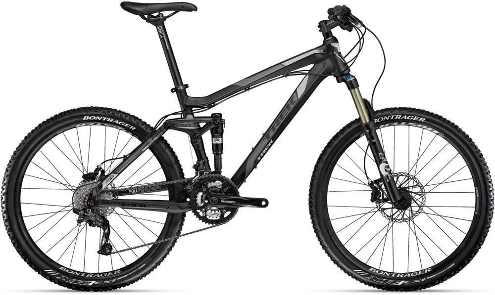 Trek Fuel EX 8: A black mountain bike with a full suspension system, featuring Shimano gear components and Bontrager tires. The bike has a sleek design, with a prominent front fork and an ergonomic frame, positioned upright for display against a plain background.