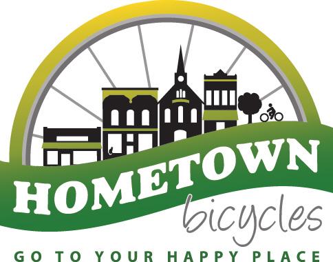 Logo for Hometown Bicycles featuring a stylized representation of a small-town skyline with buildings, a church steeple, a tree, and a bicycle. The text "HOMETOWN Bicycles" is prominently displayed, accompanied by the tagline "Go to Your Happy Place." The color scheme includes green, yellow, and black.