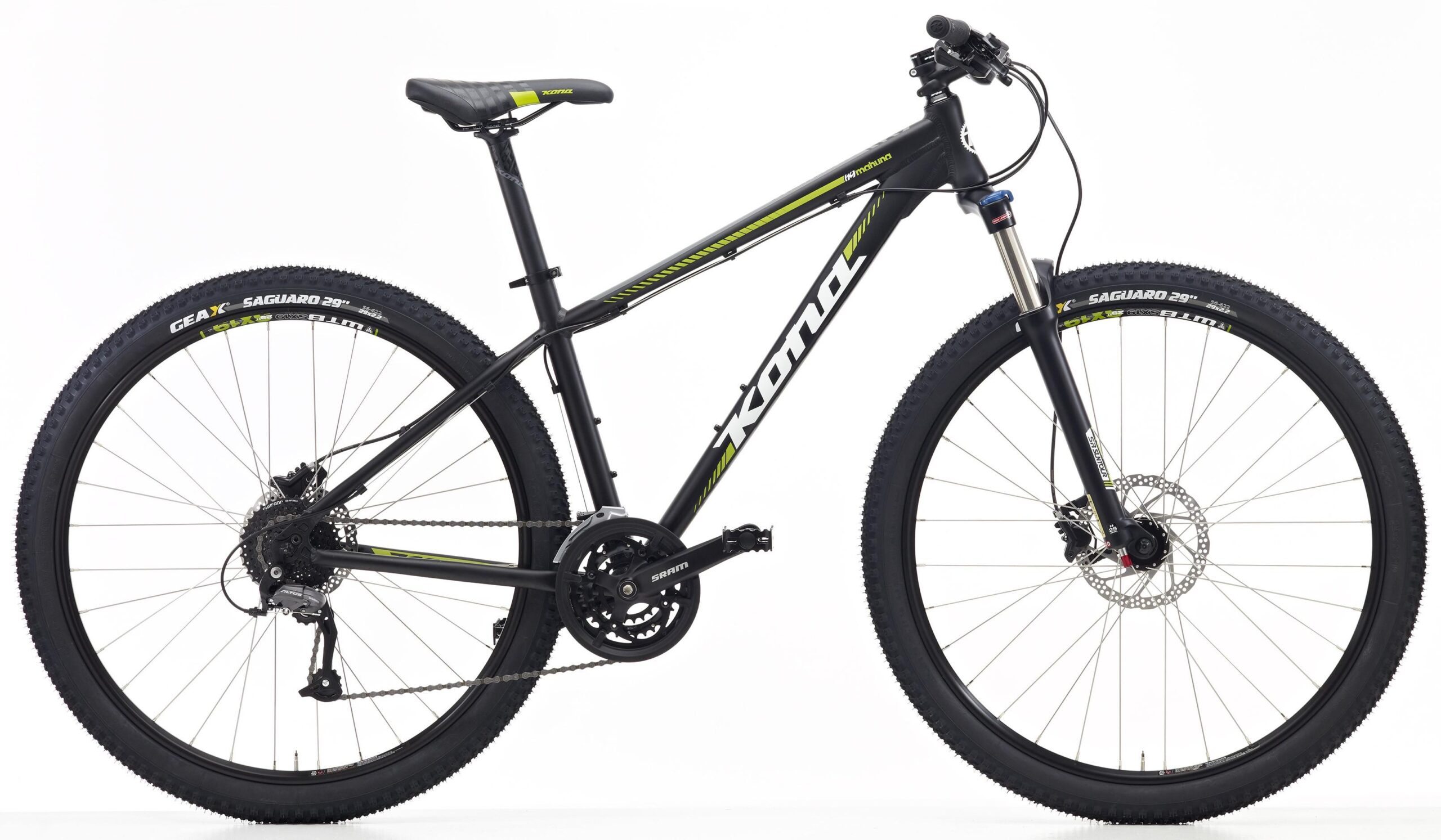 Kona Mahuna: A black mountain bike with green accents, featuring a lightweight frame, disc brakes, and 29-inch tires, displayed against a white background.