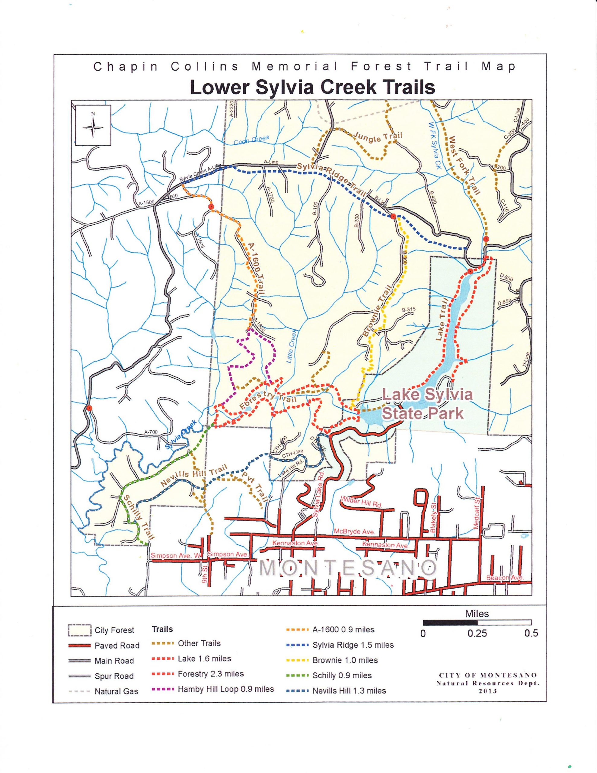 Map of the Chapin Collins Memorial Forest Trail, depicting the Lower Sylvia Creek Trails in Montesano. The map shows various trails, roads, and landmarks, including Lake Sylvia State Park. Trailing distances are indicated, along with key features and associated roads. Sylvia Ridge Loop mountain bike trail.