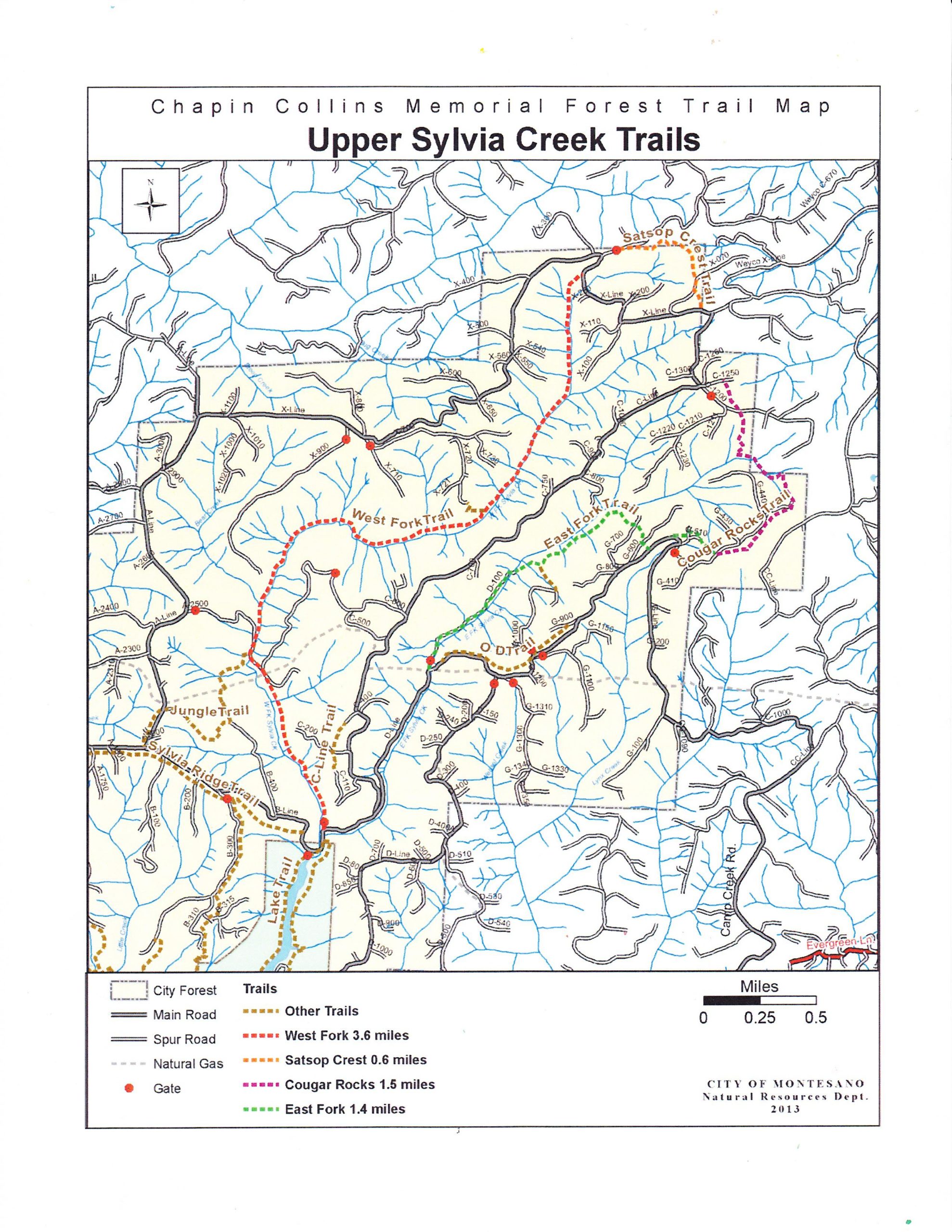 Alt text: A trail map of the Chapin Collins Memorial Forest, detailing the Upper Sylvia Creek Trails. The map includes marked trails such as West Fork, Satsop Crest, Cougar Rocks, and East Fork, along with city forest areas, main roads, and natural gas lines. The scale is indicated at the bottom, and key features like gates and trail lengths are labeled. Sylvia Ridge Loop mountain bike trail.