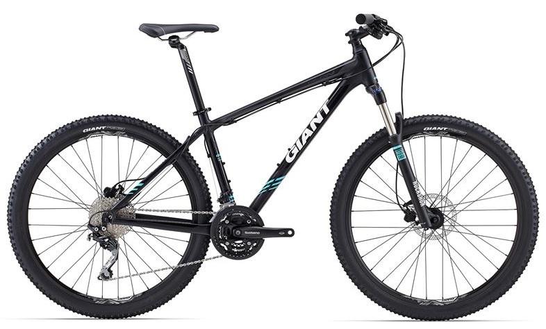 Giant Talon 27.5 2: A black mountain bike with blue and white accents, featuring a lightweight frame, front suspension, and wide tires for off-road performance. The bike has disc brakes and multiple gears, making it suitable for various terrains.