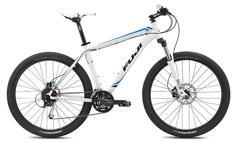 Fuji Nevada 27-5 1.5: Alt text: A white mountain bike with blue accents, featuring thick tires, a suspension fork, and disc brakes.
