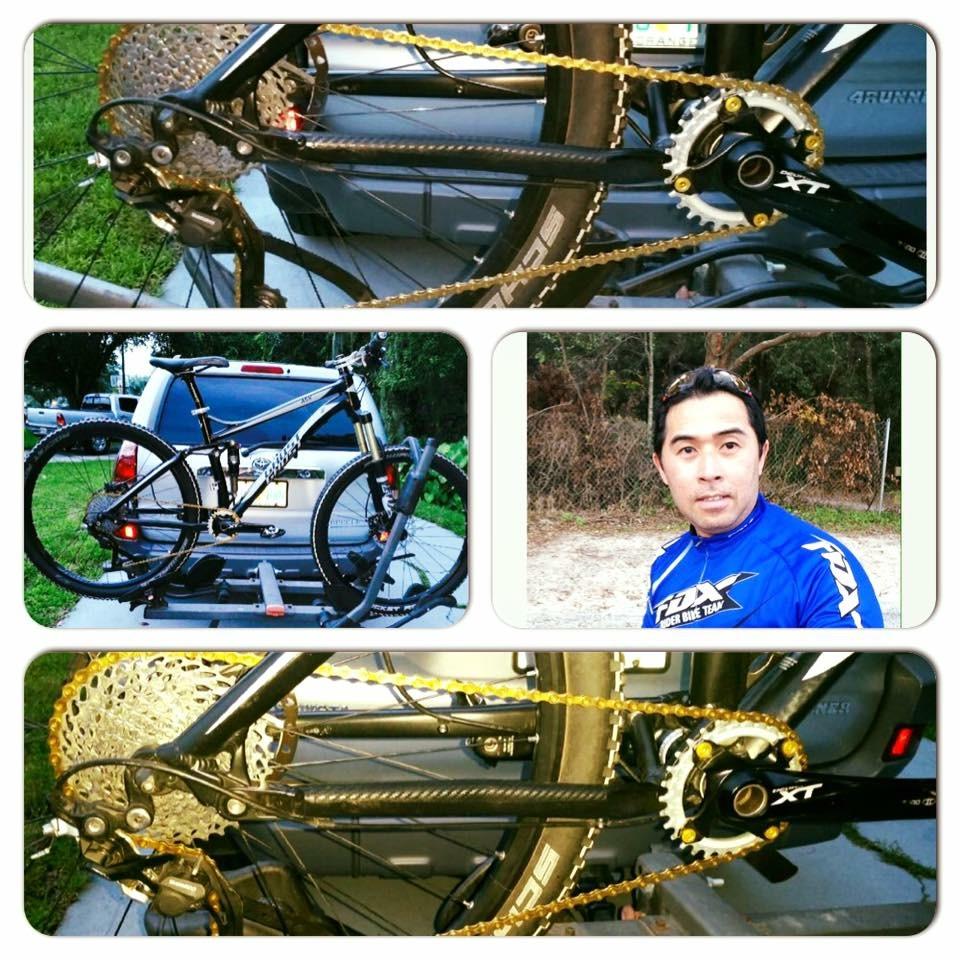 Ghost Ghost ASX 7500: Alt tag: A collage of images featuring a mountain bike mounted on the back of a vehicle, showcasing its chain and gear system. The bike is primarily black with gold accents, and there is a person in a blue cycling jersey standing nearby. The background includes a blurred landscape of trees.