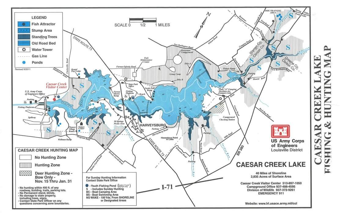 Map of Caesar Creek Lake, showing fishing and hunting zones, including marked areas for fish attractors, stumps, standing trees, and water features. The map includes details such as no hunting zones, deer hunting designations, and nearby roads, along with a legend for reference. Caesar Creek mountain bike trail.