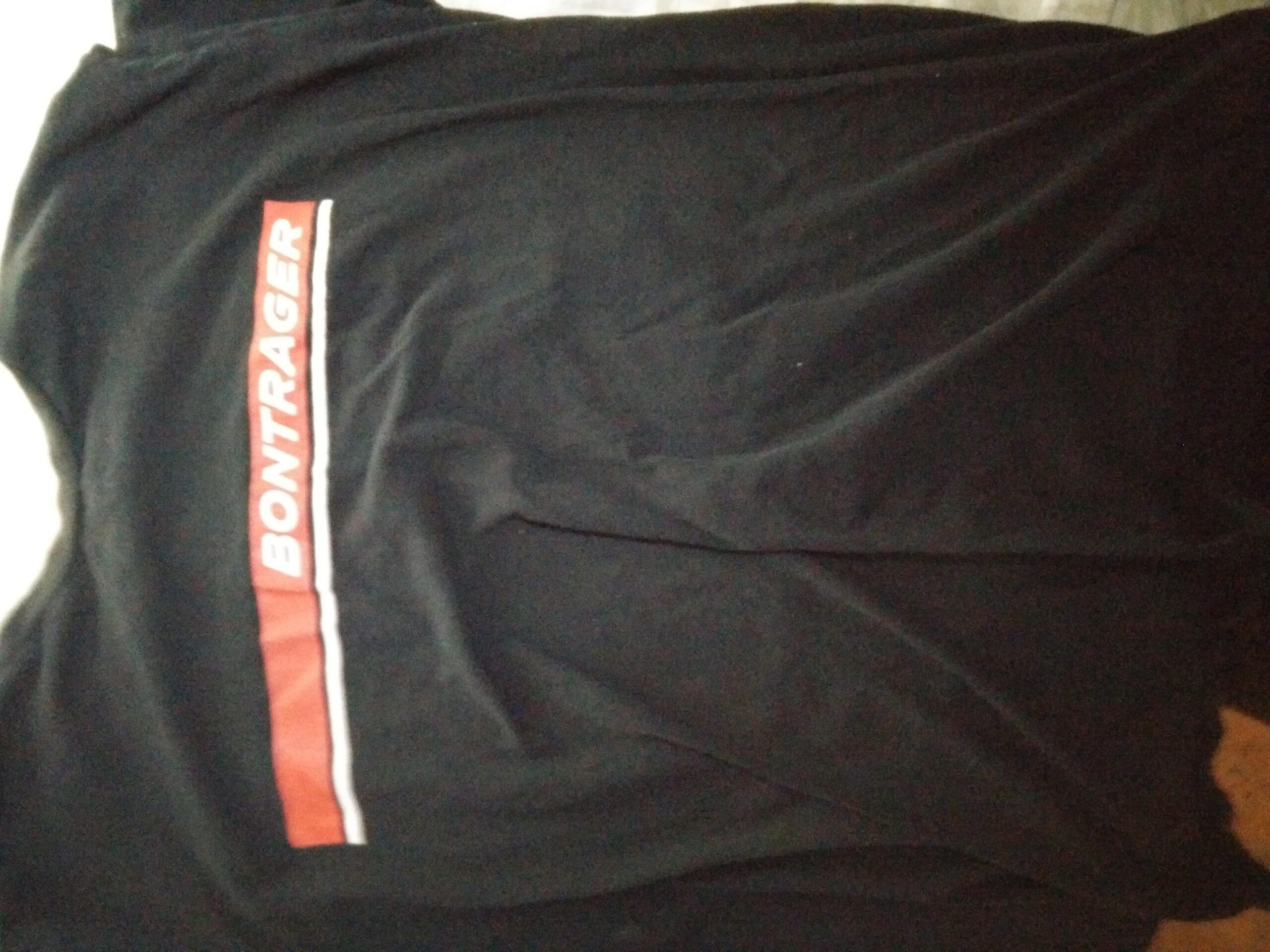 Bontrager Bontrager Logo T-Shirt: Black shirt with the word "BONTRAGER" in bold red letters and a white accent line, displayed lying flat.