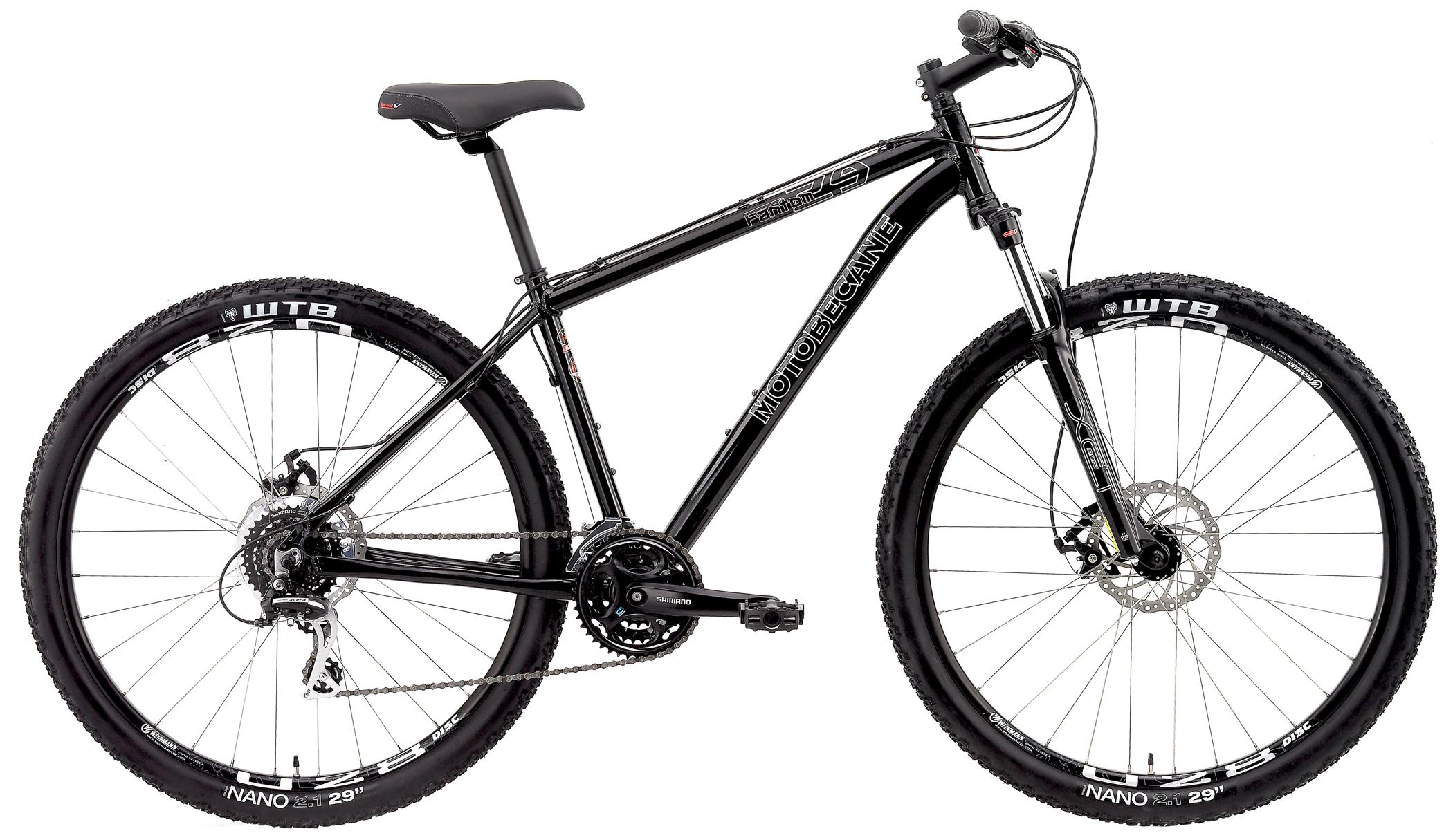 Motobecane Fantom 29 LTD: A black Motobecane Fantom mountain bike featuring a lightweight aluminum frame, front suspension, and 29-inch wheels with WTB Nano tires. The bike is equipped with Shimano components and has disc brakes. It is shown against a plain white background.