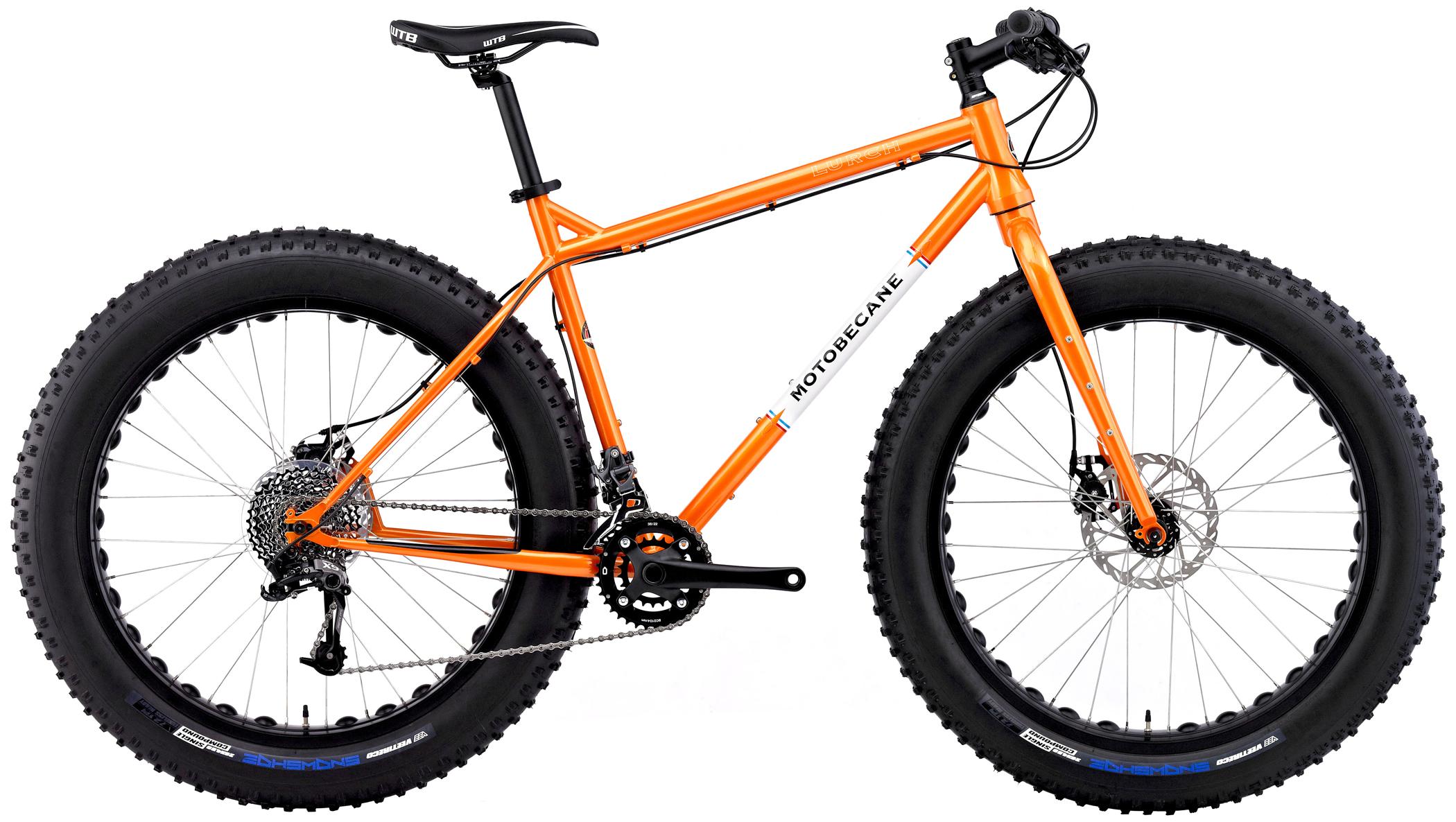 Motobecane Lurch: An orange fat tire mountain bike with a sleek aluminum frame, featuring large, rugged tires designed for off-road terrain. The bike includes a disc brake system, a single front chainring, and a rear derailleur for smooth shifting. The handlebars are equipped with grips, and the bike's design emphasizes durability and stability for adventurous rides.