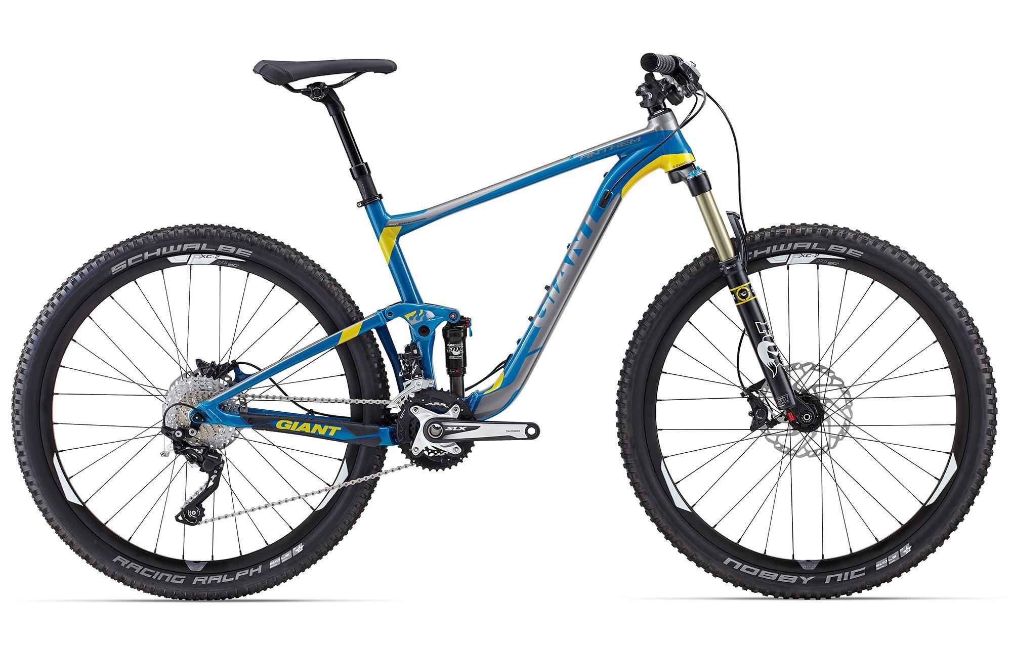 Giant Anthem SX 27.5: A blue and yellow mountain bike with a sleek design, featuring prominent front suspension, large knobby tires, and a Shimano SLX drivetrain. The bike has a lightweight frame and a dropper seat post, ideal for off-road cycling. It is displayed against a white background.