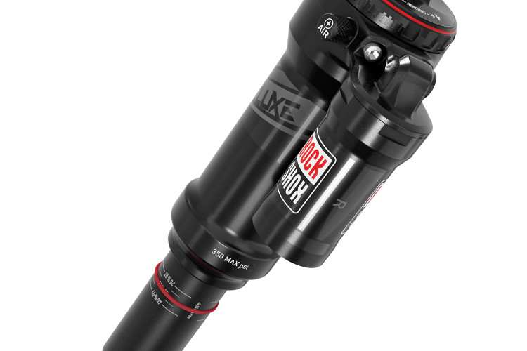 A black mountain bike rear shock absorber with adjustable settings, featuring branding from RockShox and a maximum pressure indication of 350 psi. The shock has a compact design with a noticeable air valve on the top.