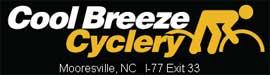 Logo for Cool Breeze Cyclery featuring the business name in white and yellow text on a black background. The logo includes a graphic of a cyclist in a riding position. The text also mentions "Mooresville, NC" and "I-77 Exit 33."