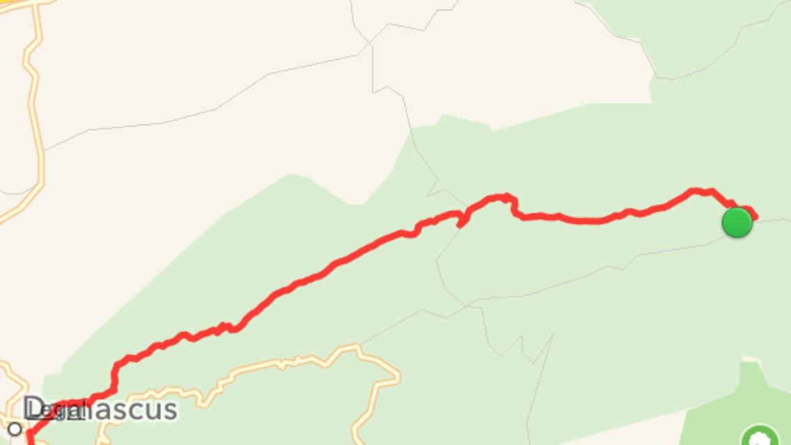 Map showing a red route extending from Damascus toward a green endpoint, indicating a traveled path through the surrounding area. Iron Mountain mountain bike trail.