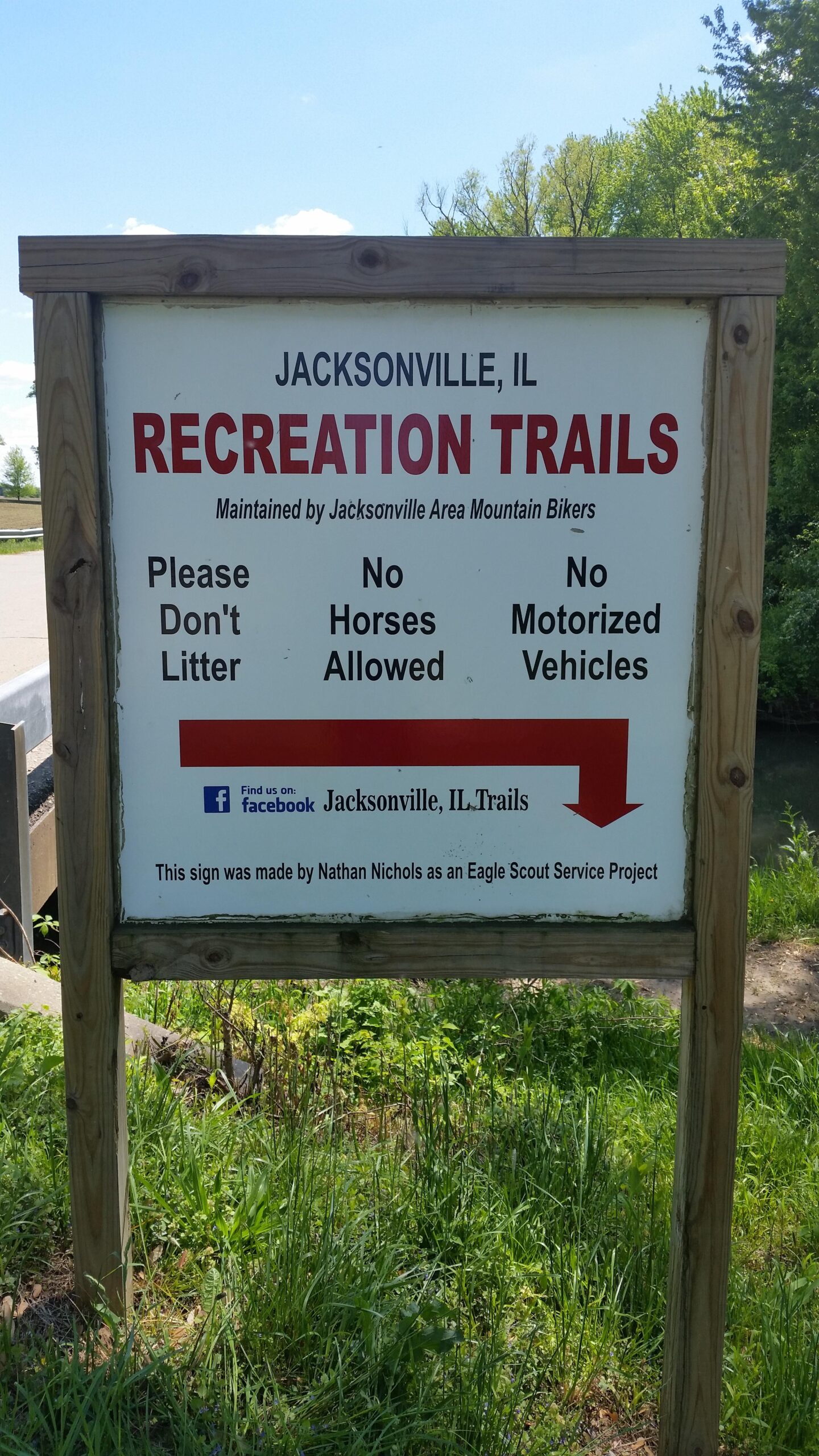 Sign for the Jacksonville, IL Recreation Trails, displaying rules such as "Please Don