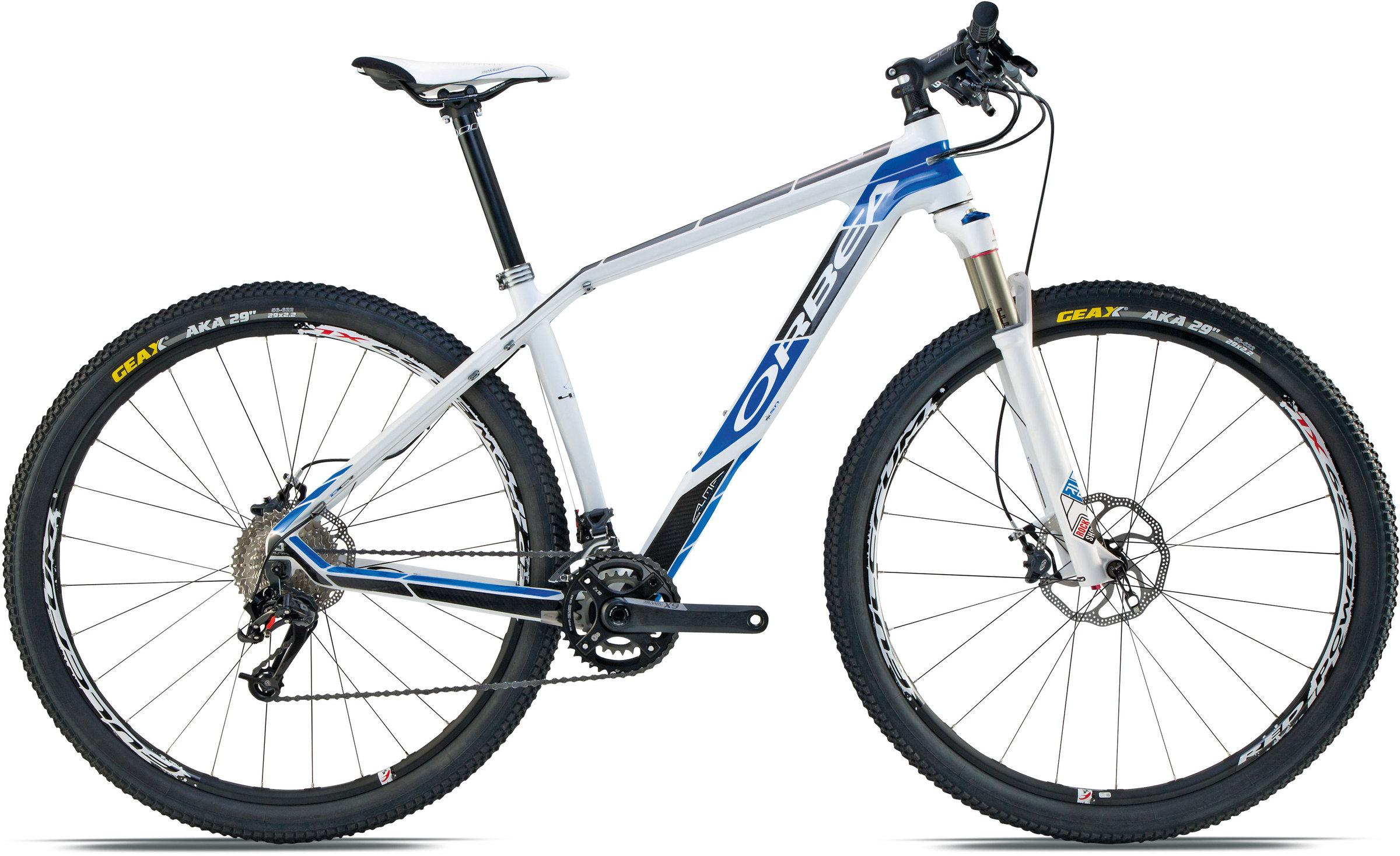 Orbea 2011 orbea alma s50: A white and blue mountain bike with a sleek design featuring a lightweight frame, front suspension fork, and 29-inch tires. The bike is equipped with a rear derailleur, crankset, and disc brakes, showcasing its sporty and functional features. The background is plain to emphasize the bike's details.