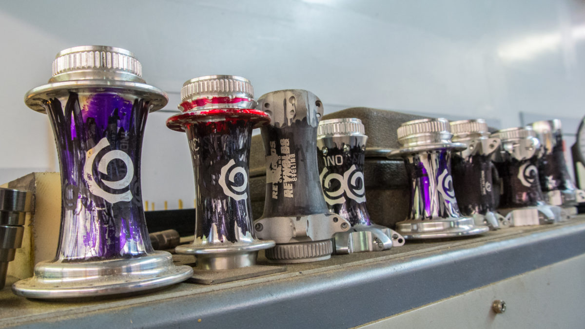 These hub shells are used to make sure the laser etcher is setup correctly; they use a sharpie to cover up previous etchings (photo: Aaron Chamberlain)