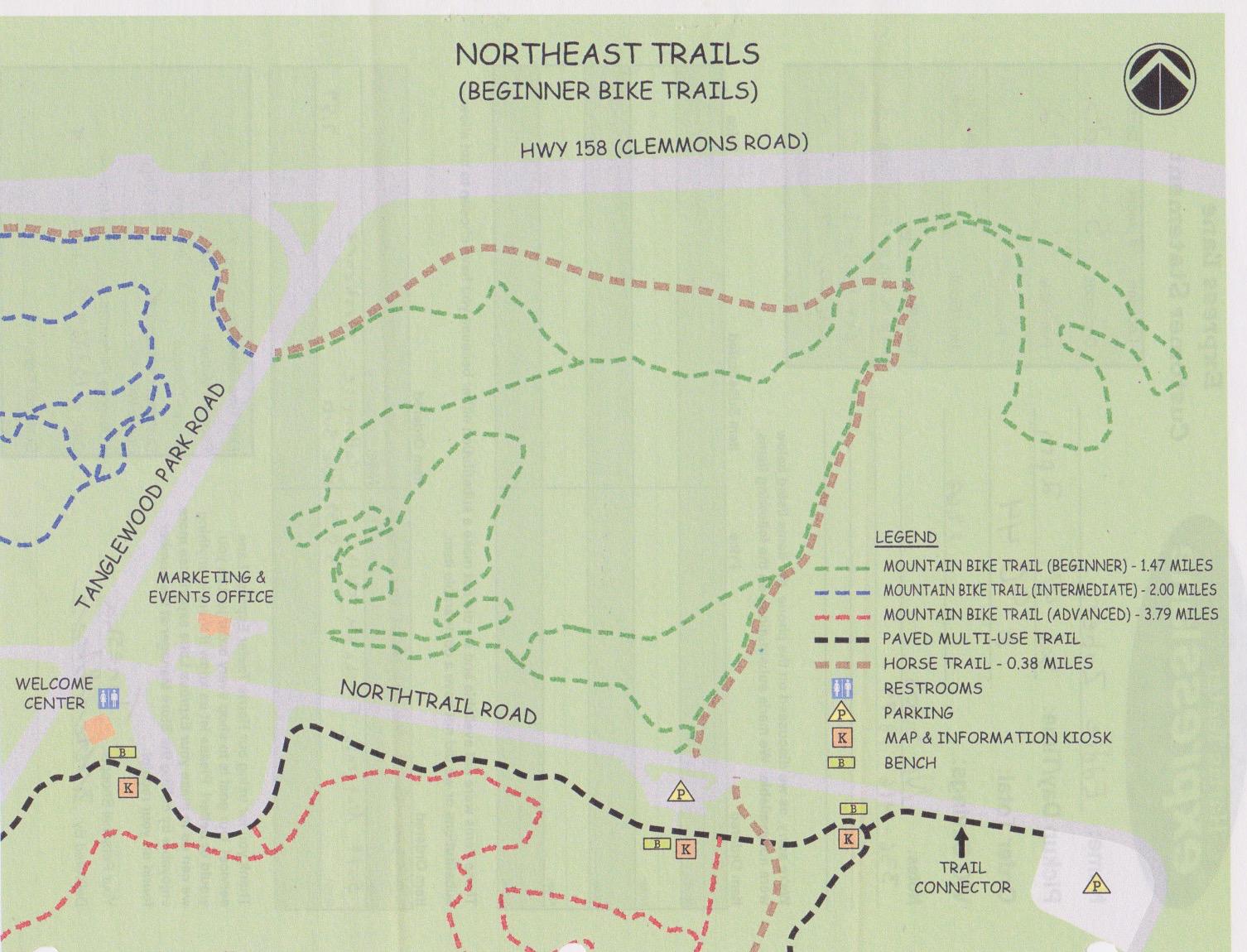 Map of the Northeast Trails, featuring beginner bike trails, with labeled roads including Tanglewood Park Road and Northtrail Road. The map indicates various trail lengths and types (beginner, intermediate, advanced), as well as locations for restrooms, parking, and a welcome center.  Tanglewood Park mountain bike trail.
