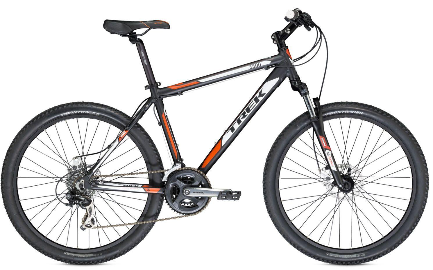 Alt text: A black and orange Trek mountain bike with a lightweight frame, front suspension, and knobby tires, positioned upright against a plain background.