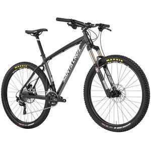 Santa Cruz Chameleon: A black mountain bike with sturdy tires, front suspension, and disc brakes, featuring "Santa Cruz" branding. The bike is positioned at an angle to showcase its frame and design details.