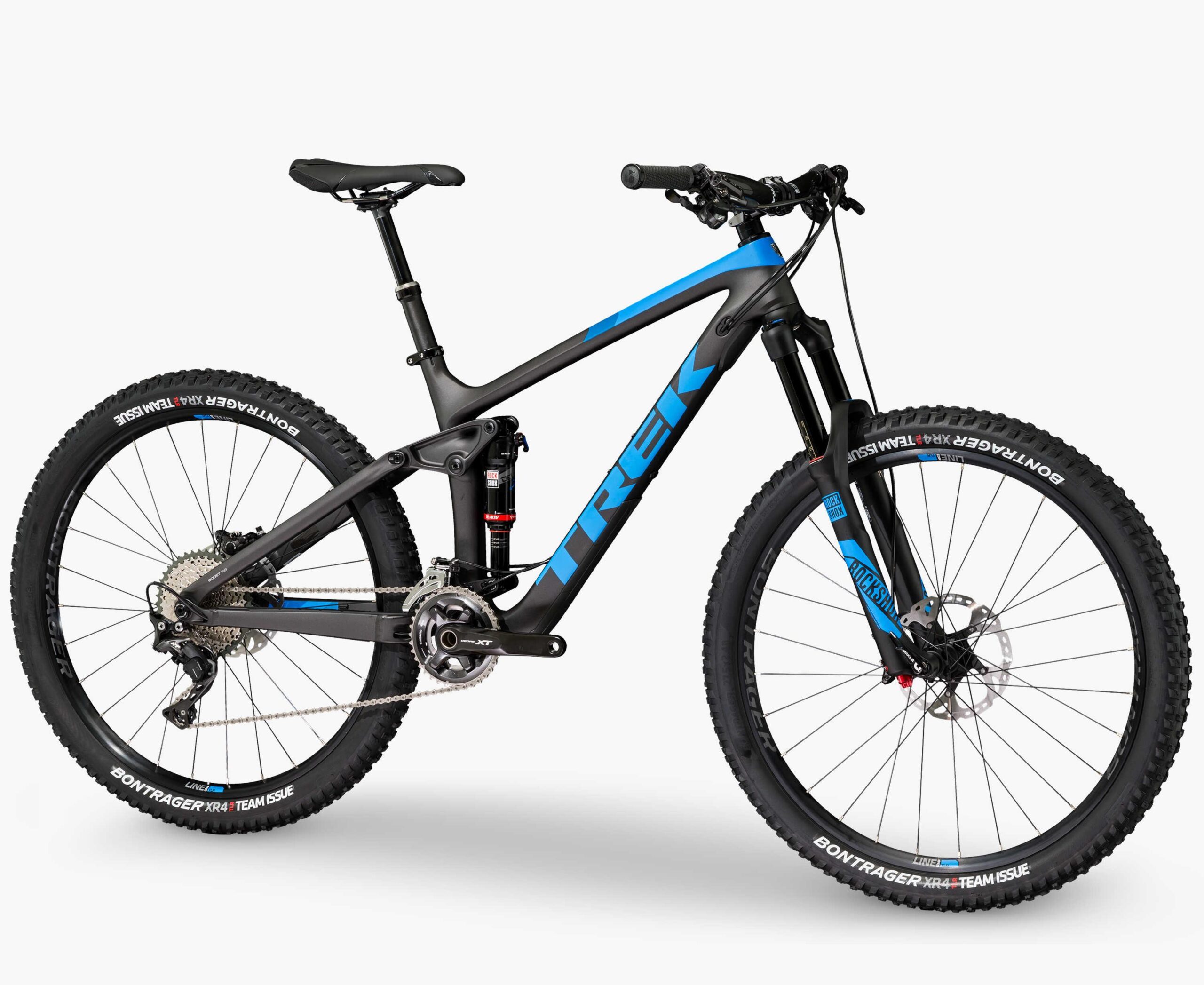 Trek Remedy 9.8 27.5/650b: A black and blue Trek mountain bike featuring a sturdy frame, suspension system, and thick tires designed for off-road terrain. The bike has a sleek design with a prominent Trek logo on the frame and high-quality components for performance.