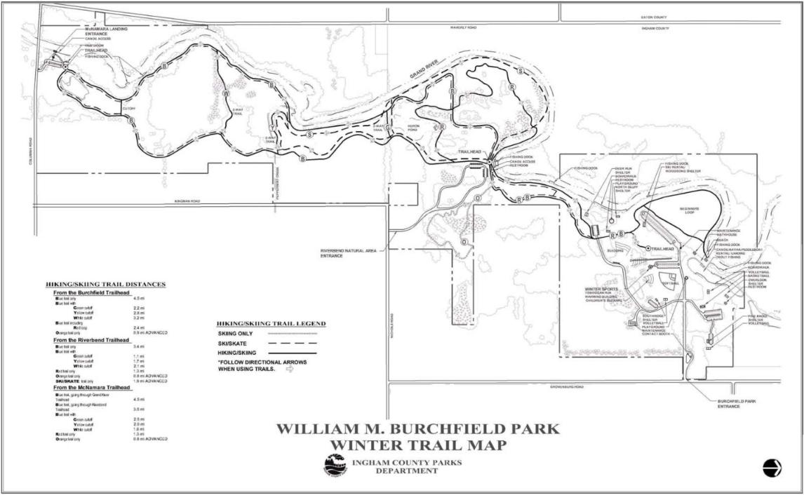Alt text: A black and white map of William M. Burchfield Park, highlighting winter hiking and skiing trails with labeled distances and trailheads. The legend indicates trails for skiing only, ski gates, and combined hiking/skiing paths. Various park features, including entrances and natural areas, are also marked. Burchfield mountain bike trail.