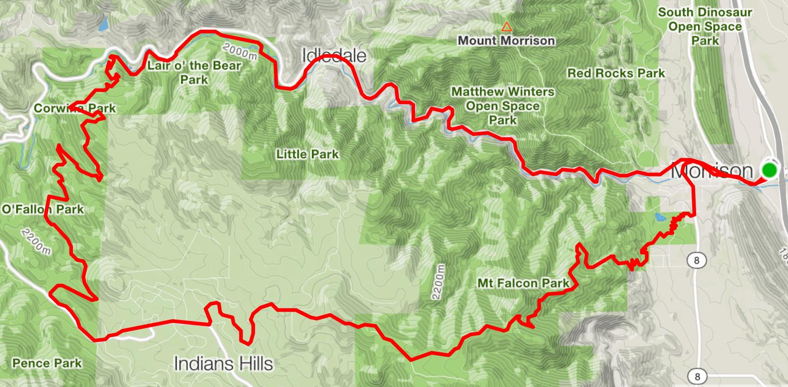 Map showing a hiking or biking route outlined in red, weaving through various parks and mountainous terrain, including Lair o