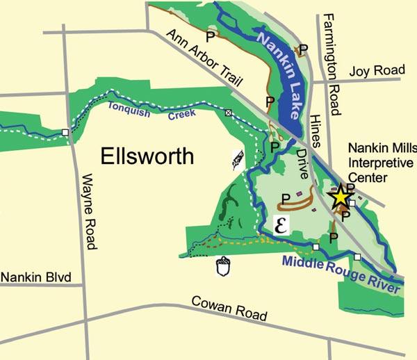 A map of the Ellsworth area, highlighting Nankin Lake, the Middle Rouge River, and various trails such as the Ann Arbor Trail. Notable locations include the Nankin Mills Interpretive Center and parking areas, marked with the letter "P." Key roads like Hines Drive and Farmington Road are also displayed. William P. Holliday Forest and Wildlife Preserve mountain bike trail.
