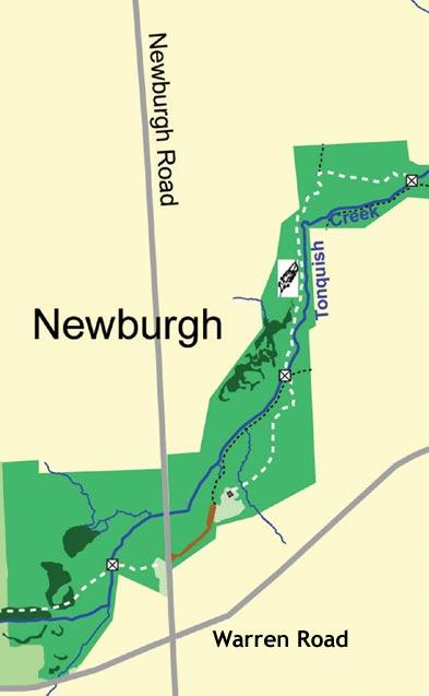Map of Newburgh area, showing trails, waterways, and surrounding green spaces. Major roads include Newburgh Road and Warren Road. Key landmarks such as a creek and various trails are indicated. William P. Holliday Forest and Wildlife Preserve mountain bike trail.
