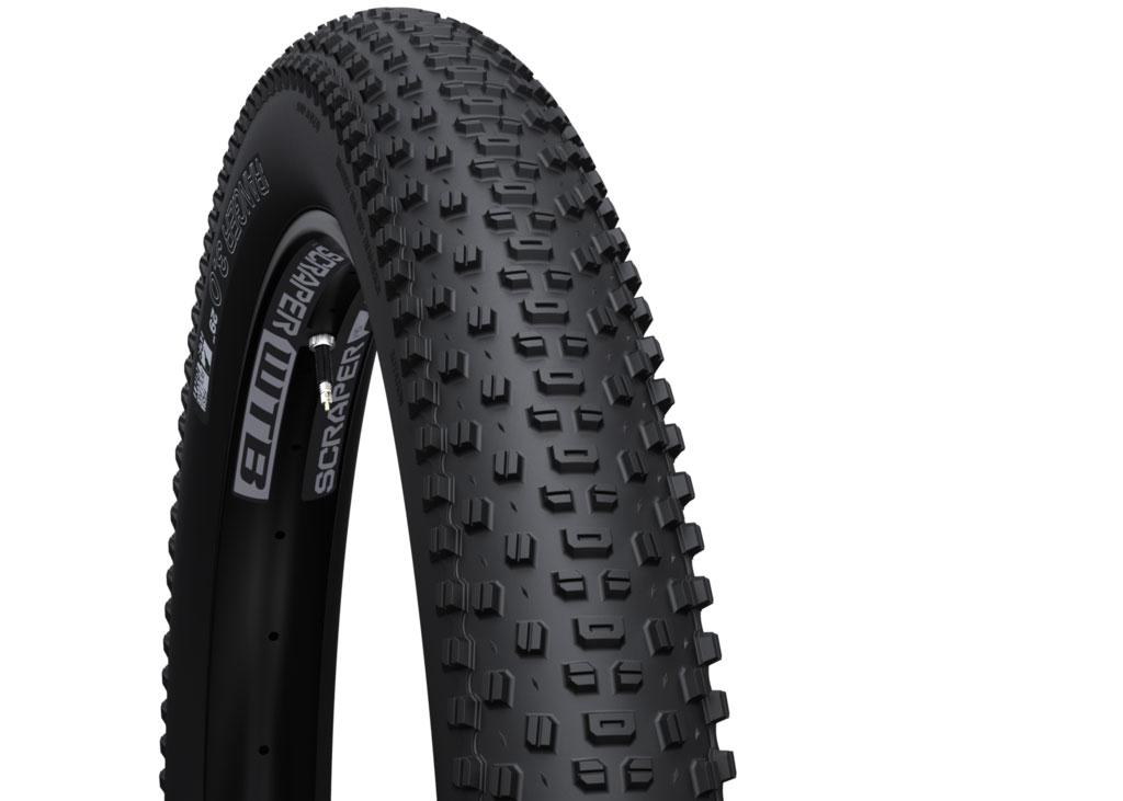 WTB Ranger: A close-up image of a mountain bike tire featuring an aggressive tread pattern, designed for optimal traction on rugged terrain. The tire has a black rubber exterior with raised knobs and a sidewall that indicates brand and model details.