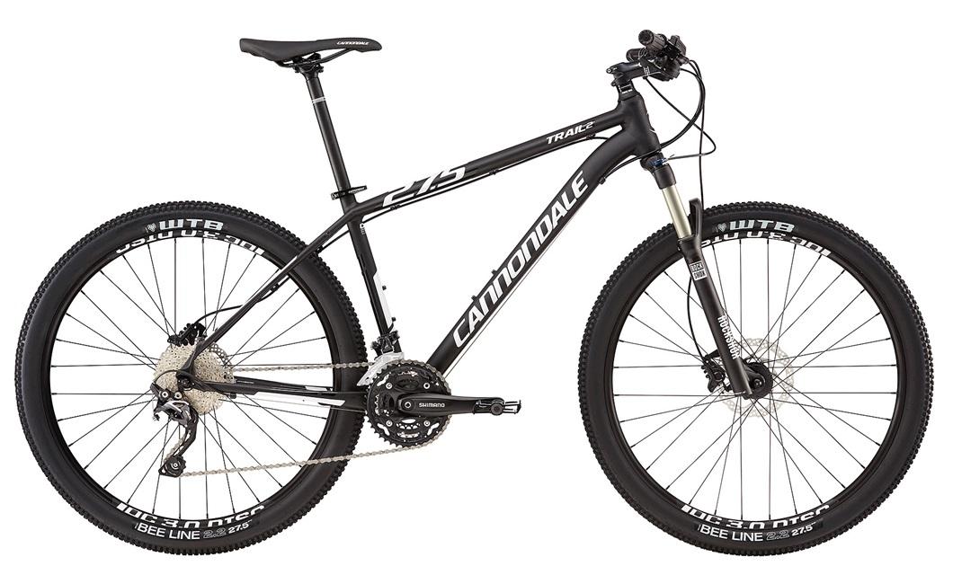 Cannondale Trail 2: A black mountain bike with a sleek design, featuring wide tires and a lightweight frame. The bike is equipped with Shimano components, including a geared crankset and multiple gears for varied terrain. The wheels display WTB branding, and the bike is designed for trail riding, showcasing a suspension fork and a comfortable saddle.